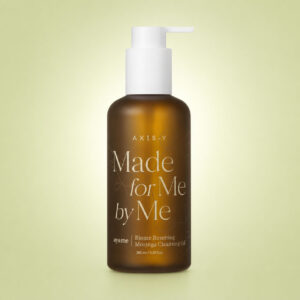 روغن پاک کننده AXIS-Y Biome Resetting Moringa Cleansing Oil با بطری سفید و طراحی مینیمال