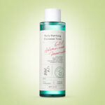تونر ضدجوش اکسیس وای Daily Purifying Treatment Toner با بطری شفاف سبز و بسته‌بندی سفید
