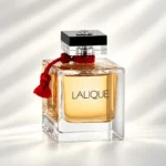 عطر Lalique Le Parfum زنانه با شیشه طلایی و قرمز