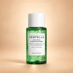 تصویر چهار محصول پک مسافرتی SKIN1004 Madagascar Centella Tea-Trica شامل آمپول، فوم شستشو، کرم B5 و تونر روی پس‌زمینه سفید